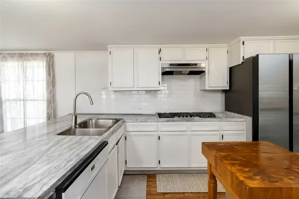 a room with a bed and a window