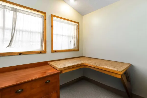 a kitchen with sink and window