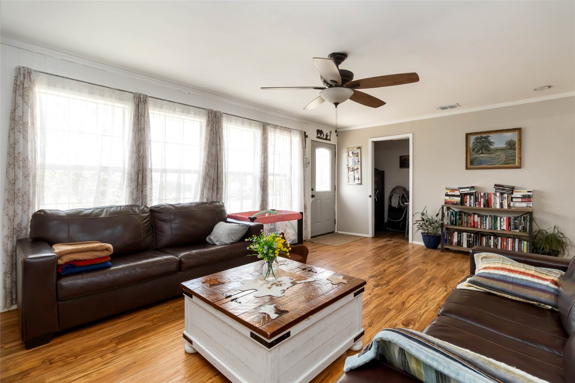 227 Henderson Lane Lockhart, TX 78644 - Photo 6 of 38 a living room with furniture and a large window