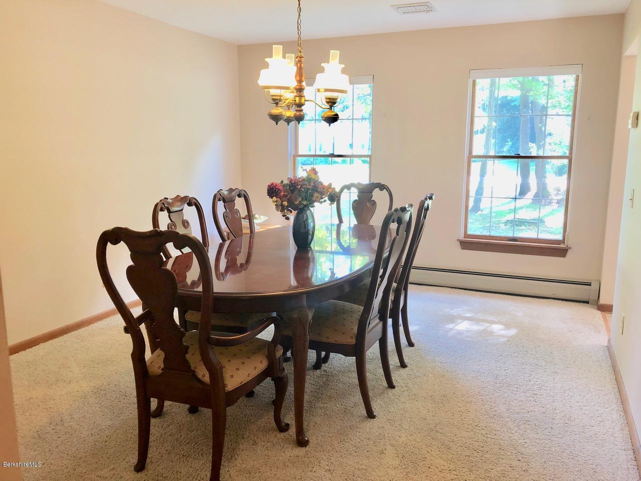 83 Pine Knoll Road Lenox, MA 01240 - Photo 15 of 32 a dining room with furniture and window