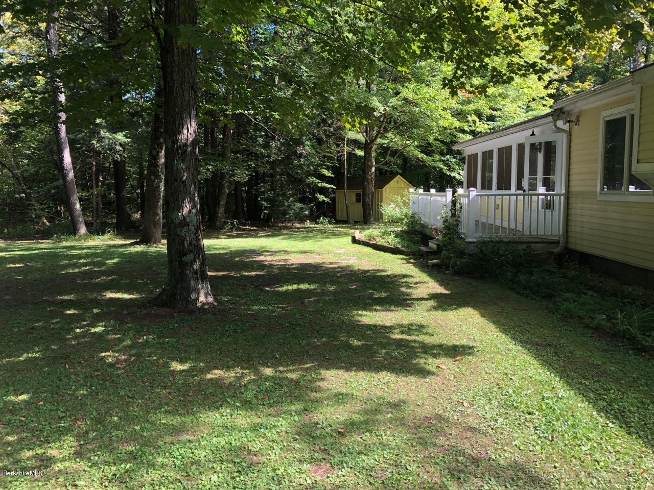 83 Pine Knoll Road Lenox, MA 01240 - Photo 4 of 32 a view of a yard in front of house