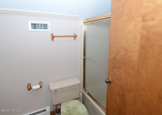 83 Pine Knoll Road Lenox, MA 01240 - Photo 31 of 32 a bathroom with a shower and a toilet