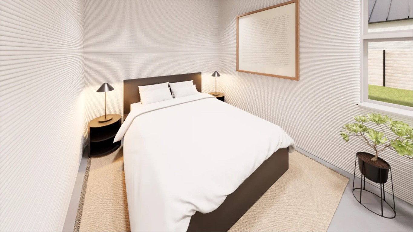 101 Rough Crk Road Georgetown, TX 78628 - Photo 4 of 11 a bedroom with a bed and a chair