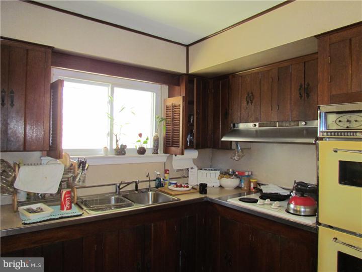 2122 Colony Road Jamison, PA 18929 - Photo 3 of 14 a kitchen with sink cabinets and appliances