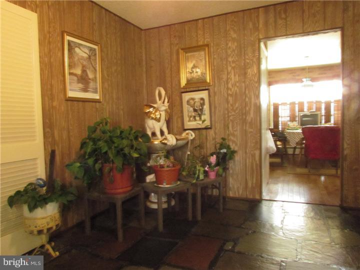 2122 Colony Road Jamison, PA 18929 - Photo 7 of 14 a view of a livingroom with furniture and front door