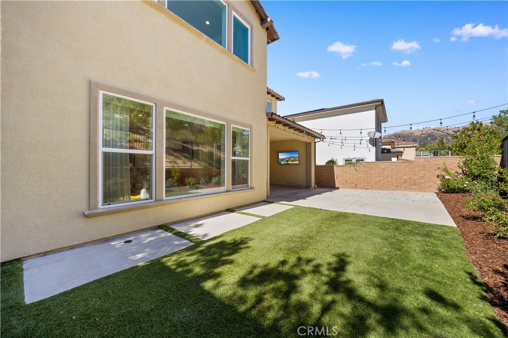 12000 Mirabel Way Porter Ranch, CA 91326 - Photo 27 of 59 a view of a backyard of the house