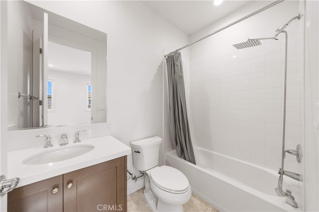 12000 Mirabel Way Porter Ranch, CA 91326 - Photo 45 of 59 a bathroom with a sink toilet and shower