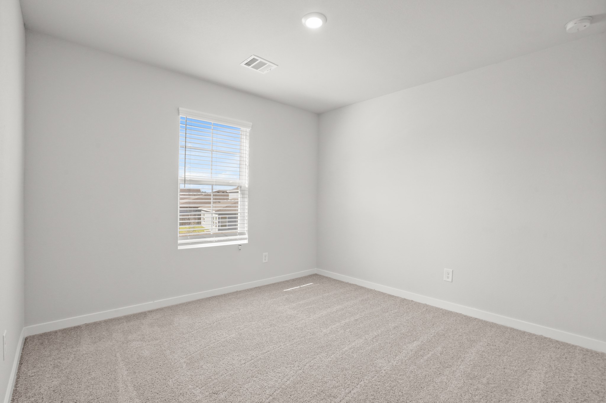 9720 Caney Bend Road Conroe, TX 77303 - Photo 15 of 24 an empty room with a window