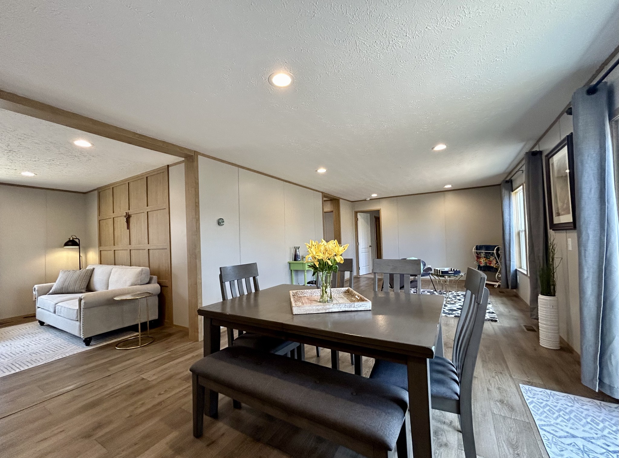 443 Sickler Road Hohenwald, TN 38462 - Photo 11 of 33 a view of a dining room with furniture and wooden floor