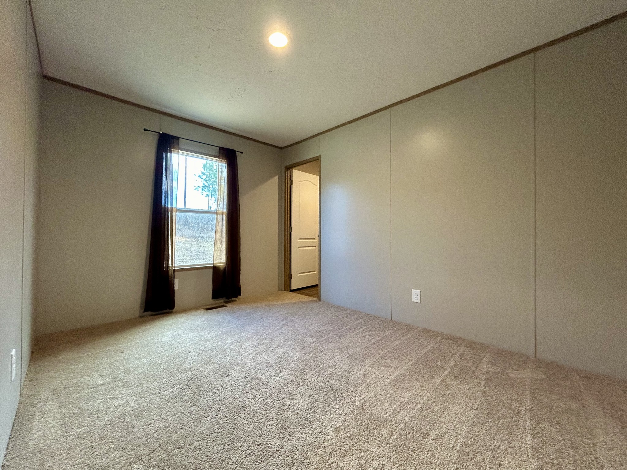 443 Sickler Road Hohenwald, TN 38462 - Photo 14 of 33 an empty room with windows