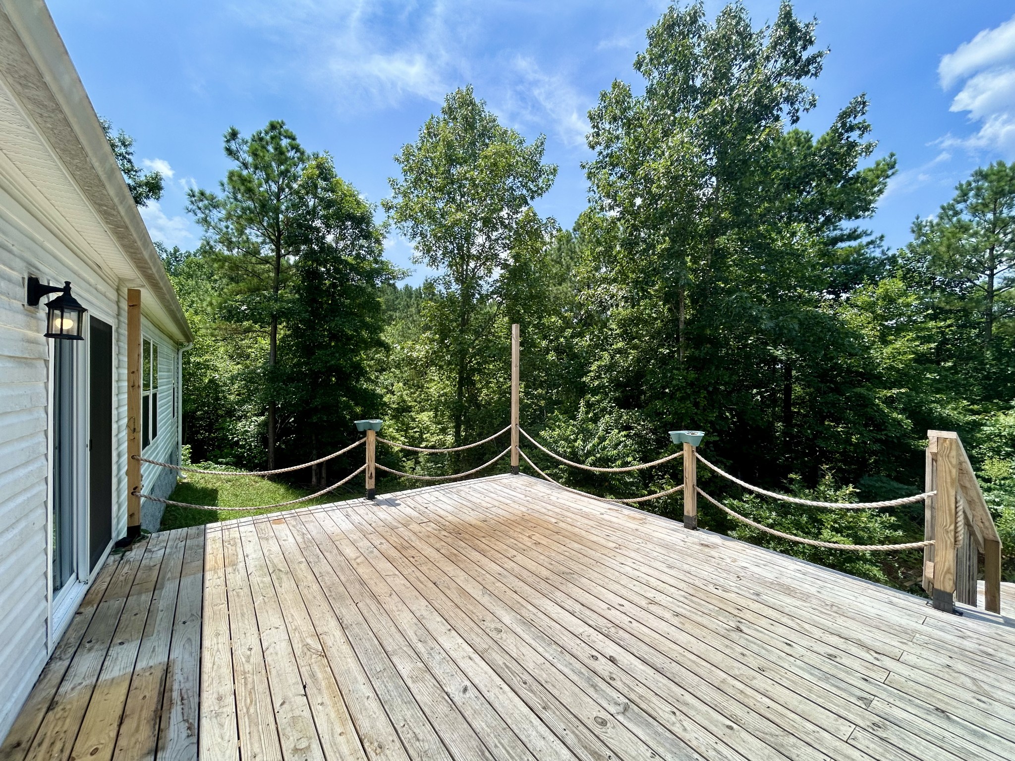 443 Sickler Road Hohenwald, TN 38462 - Photo 23 of 33 a view of outdoor space with deck and yard