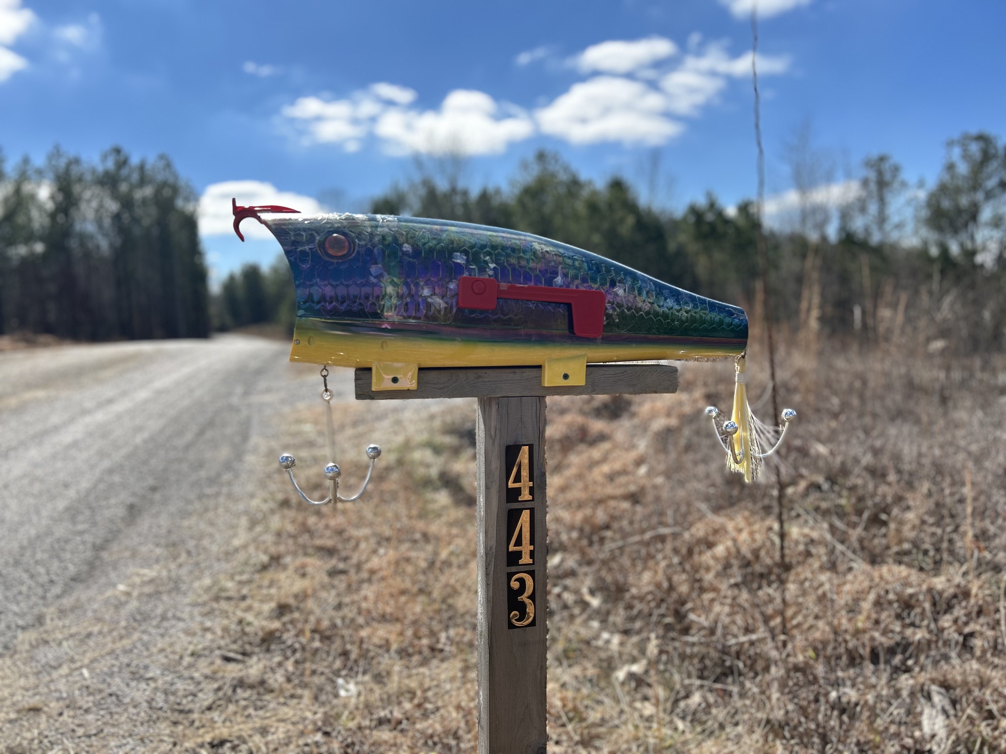 443 Sickler Road Hohenwald, TN 38462 - Photo 33 of 33 a view of a wooden house with a yard