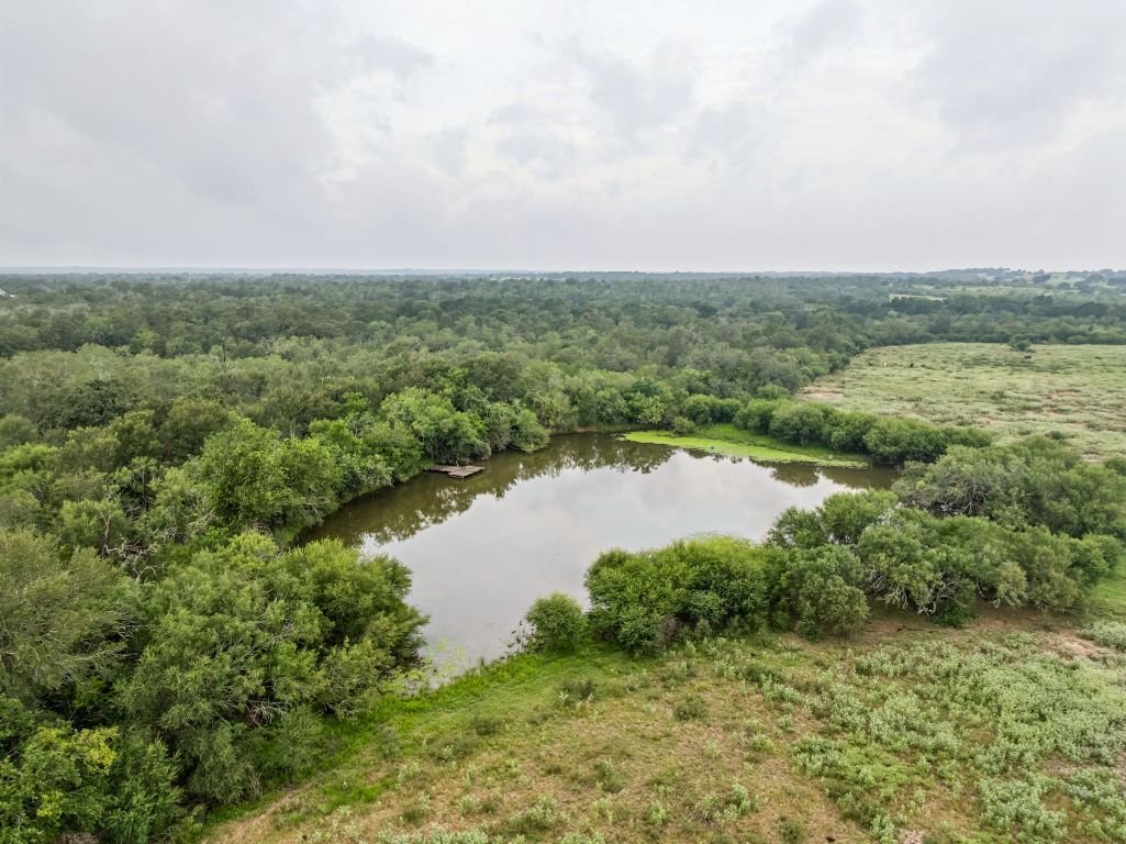 9611 Wilke Road Kingsbury, TX 78638 - Photo 20 of 23 view of a lake with green space