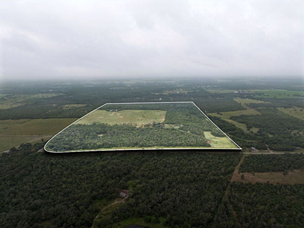 9611 Wilke Road Kingsbury, TX 78638 - Photo 3 of 23 a view of a swimming pool with a yard