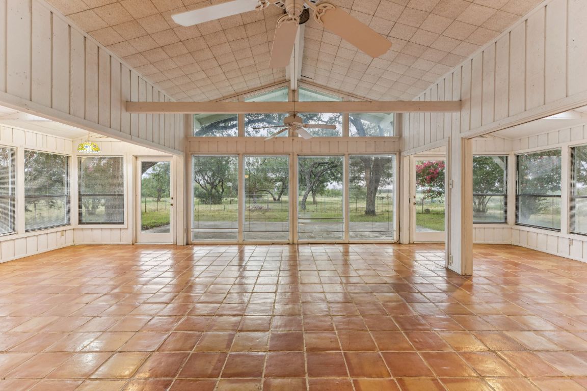 9611 Wilke Road Kingsbury, TX 78638 - Photo 10 of 23 a view of an entryway with a glass door