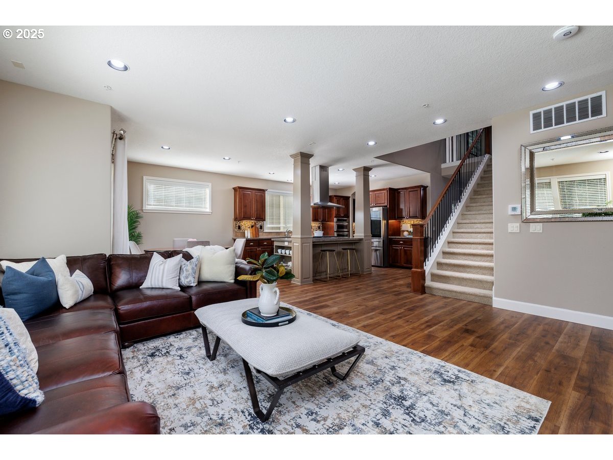 5598 Northwest 135th Avenue Portland, OR 97229 - Photo 21 of 45 a living room with furniture and wooden floor