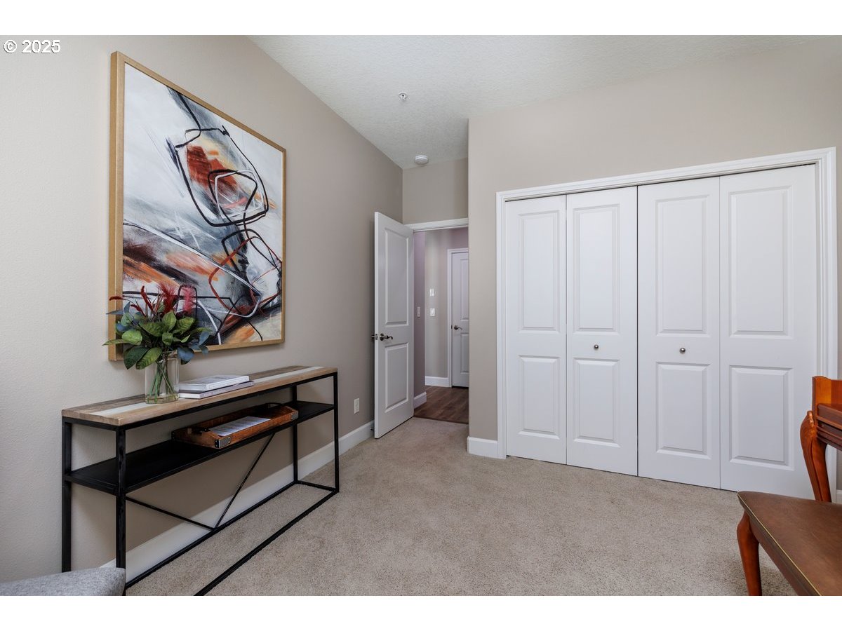 5598 Northwest 135th Avenue Portland, OR 97229 - Photo 24 of 45 a view of an entryway with wooden floor