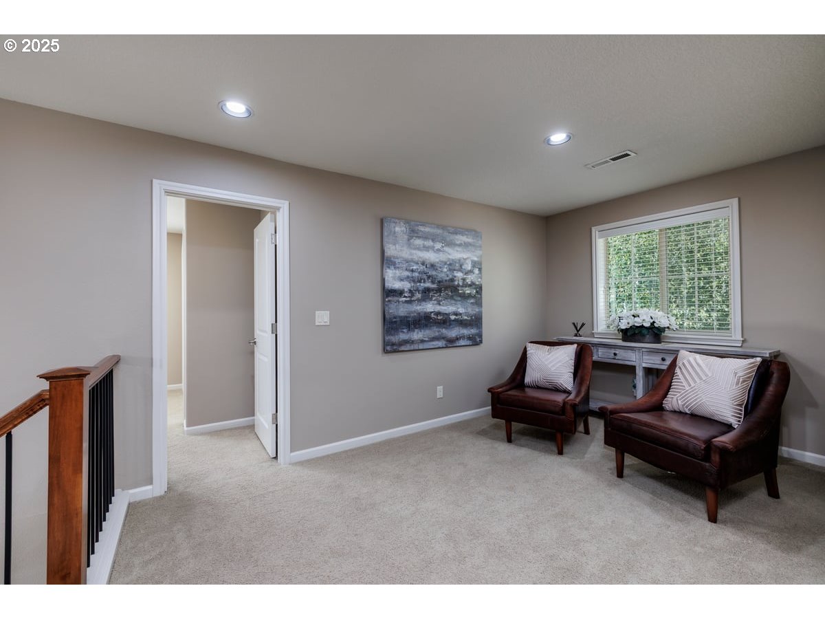5598 Northwest 135th Avenue Portland, OR 97229 - Photo 26 of 45 a living room with furniture and a window