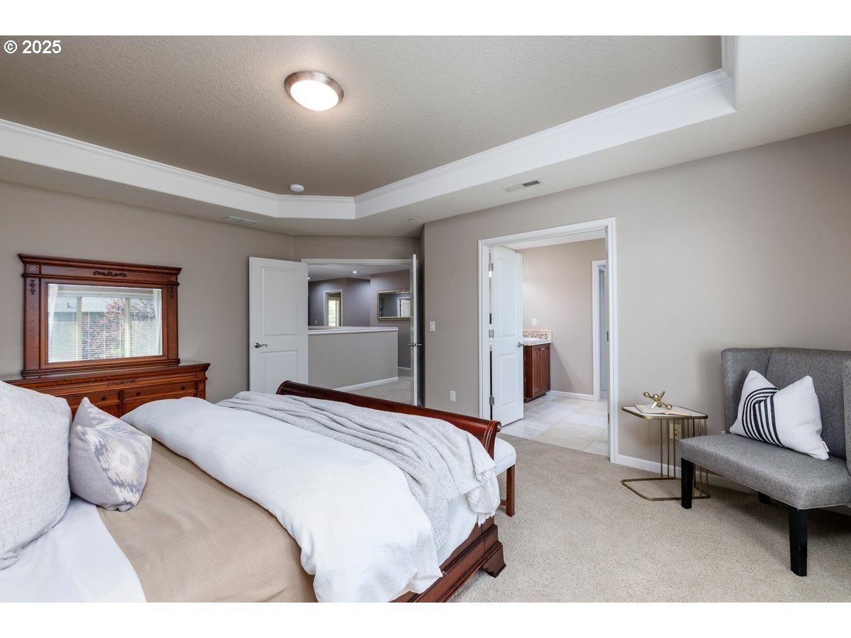 5598 Northwest 135th Avenue Portland, OR 97229 - Photo 28 of 45 a bedroom with a bed and window