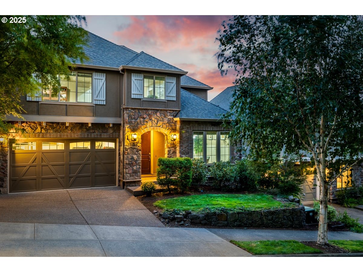 5598 Northwest 135th Avenue Portland, OR 97229 - Photo 3 of 45 a front view of a house with garden