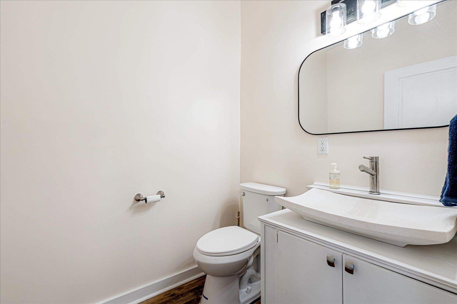245 Ecology Loop Eads, TN 38028 - Photo 13 of 23 a bathroom with a sink a toilet and a mirror