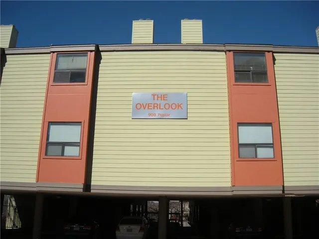 a view of a brick house with a window