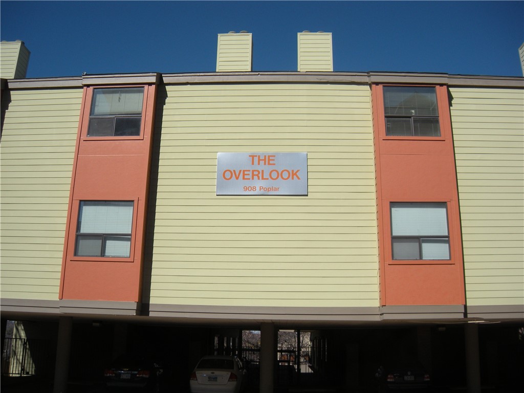 a view of a brick house with a window