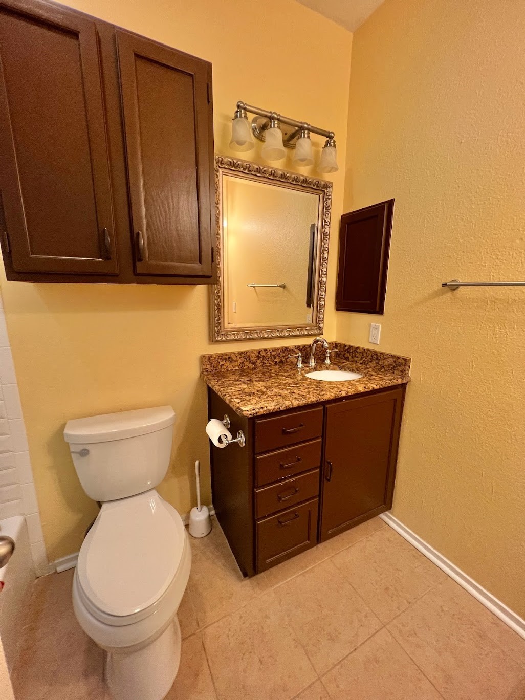 908 Poplar Street, Unit 207 Austin, TX 78705 - Photo 15 of 19 a bathroom with a sink and a toilet