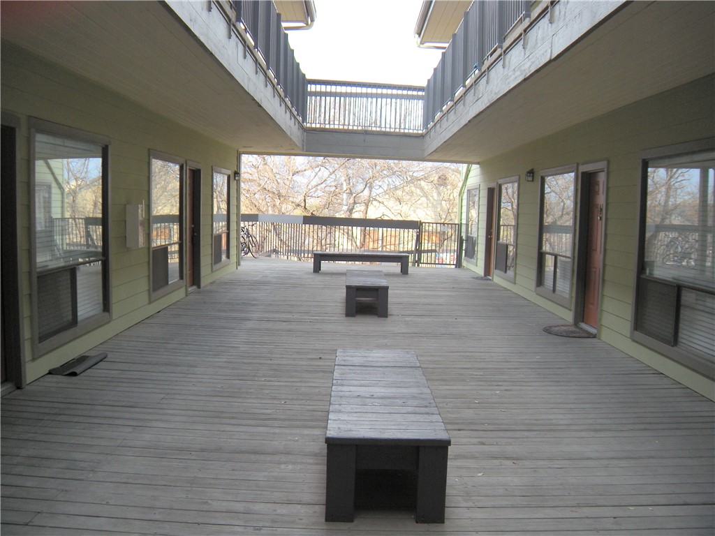 908 Poplar Street, Unit 207 Austin, TX 78705 - Photo 18 of 19 a view of entryway and hall with wooden floor