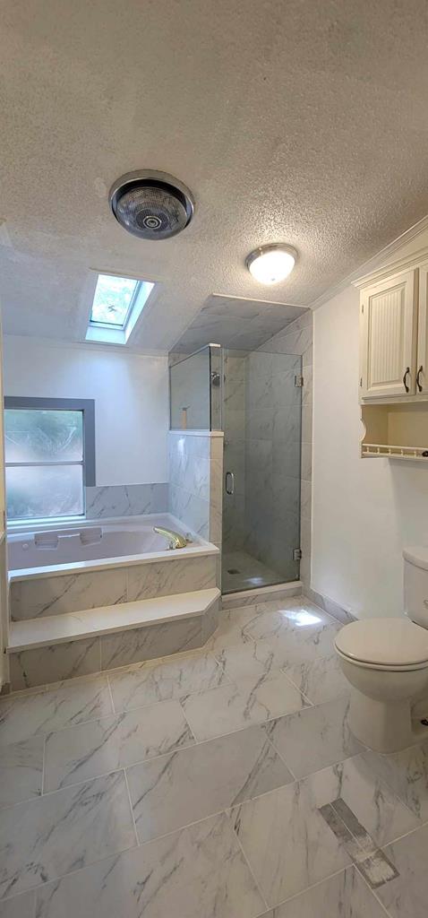 125 Sputnik Street Fortson, GA 31808 - Photo 19 of 30 a view of bathroom with bathtub and shower