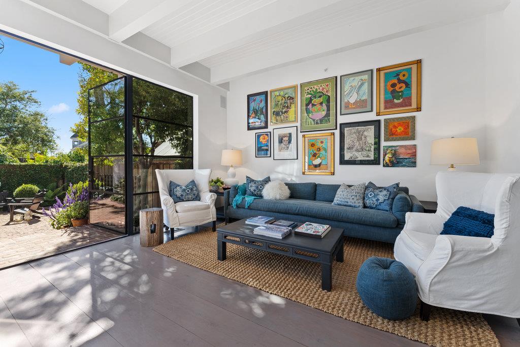 109 Central Avenue Capitola, CA 95010 - Photo 18 of 79 a living room with furniture and a large window