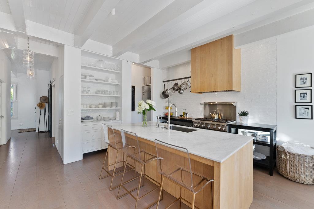 109 Central Avenue Capitola, CA 95010 - Photo 25 of 79 a kitchen with stainless steel appliances a stove a sink and a refrigerator