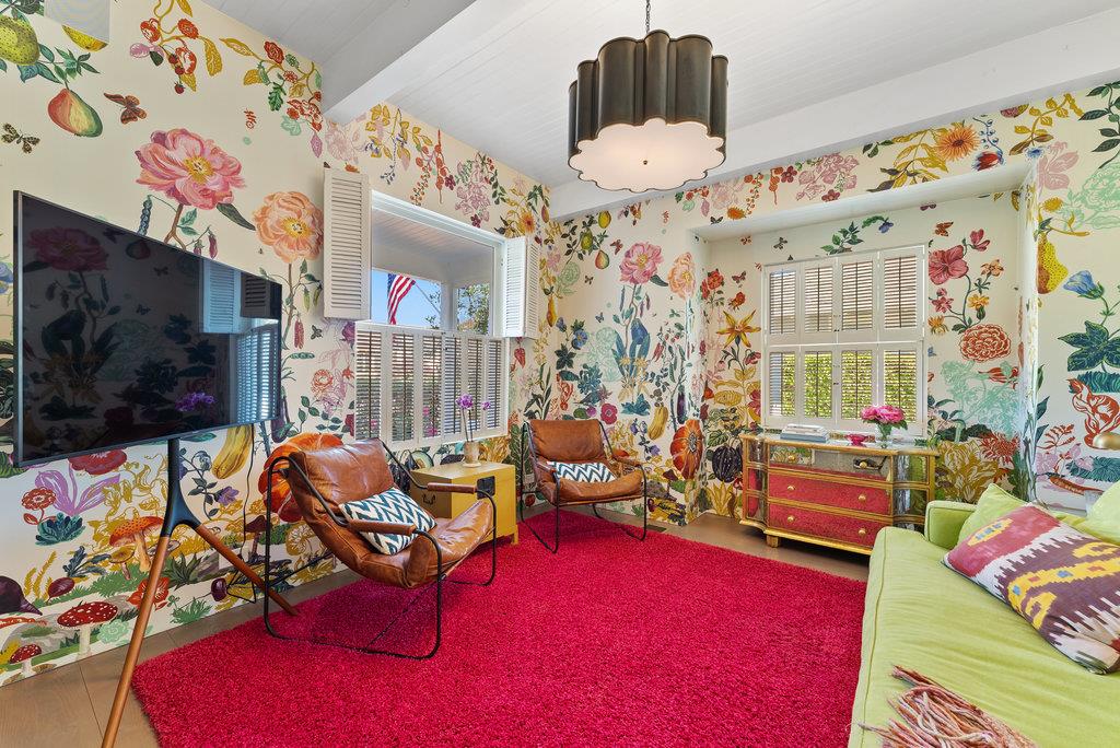 109 Central Avenue Capitola, CA 95010 - Photo 29 of 79 a bedroom with furniture and a flat screen tv