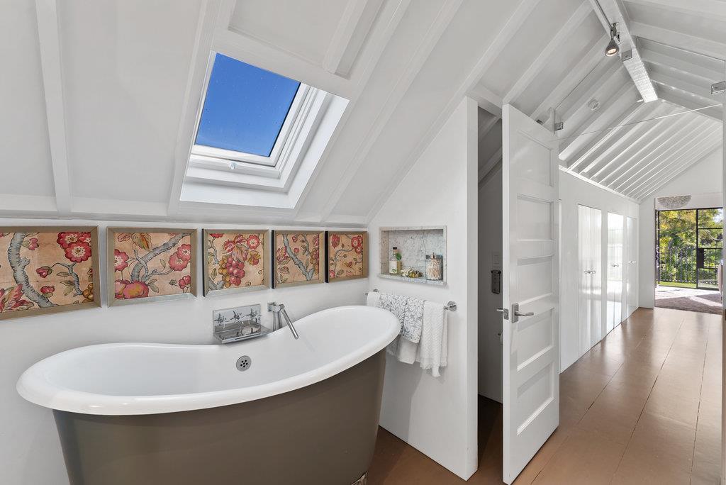 109 Central Avenue Capitola, CA 95010 - Photo 39 of 79 a bathroom with a sink and a bathtub