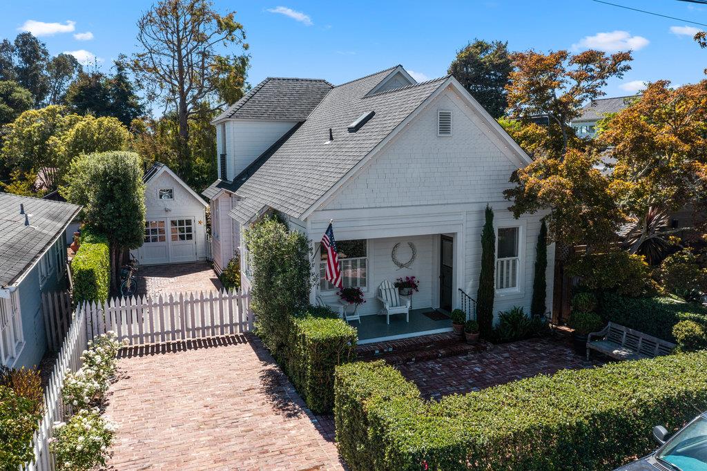 109 Central Avenue Capitola, CA 95010 - Photo 4 of 79 a front view of a house with garden