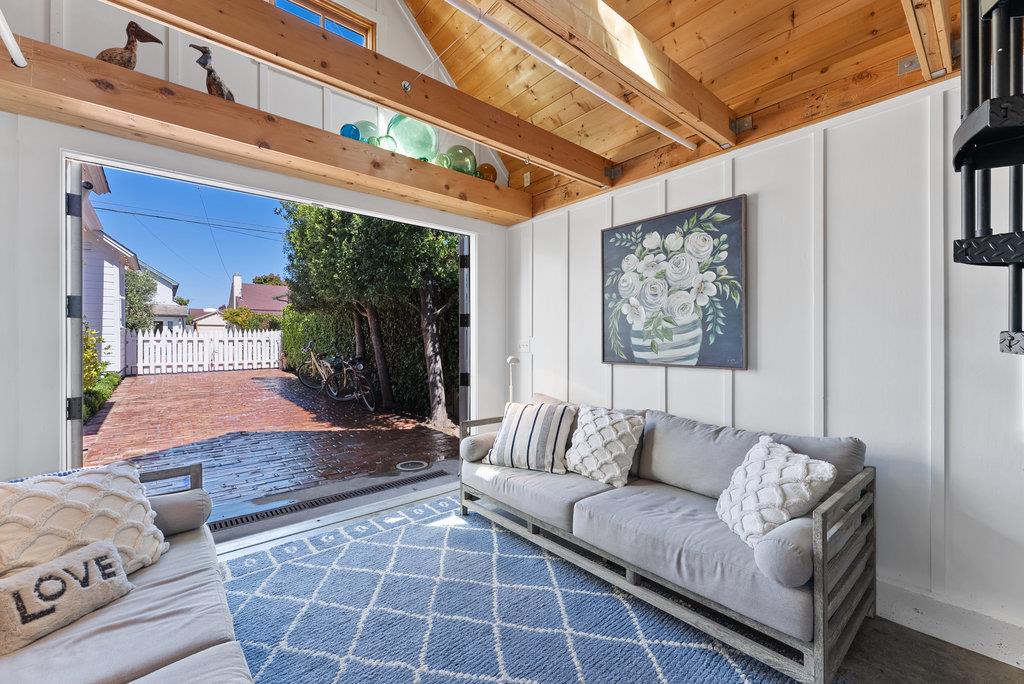 109 Central Avenue Capitola, CA 95010 - Photo 45 of 79 a living room with furniture and a rug