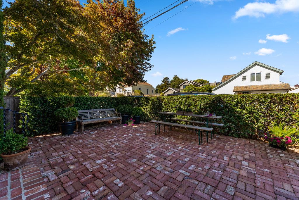109 Central Avenue Capitola, CA 95010 - Photo 59 of 79 a view of a bench in a backyard