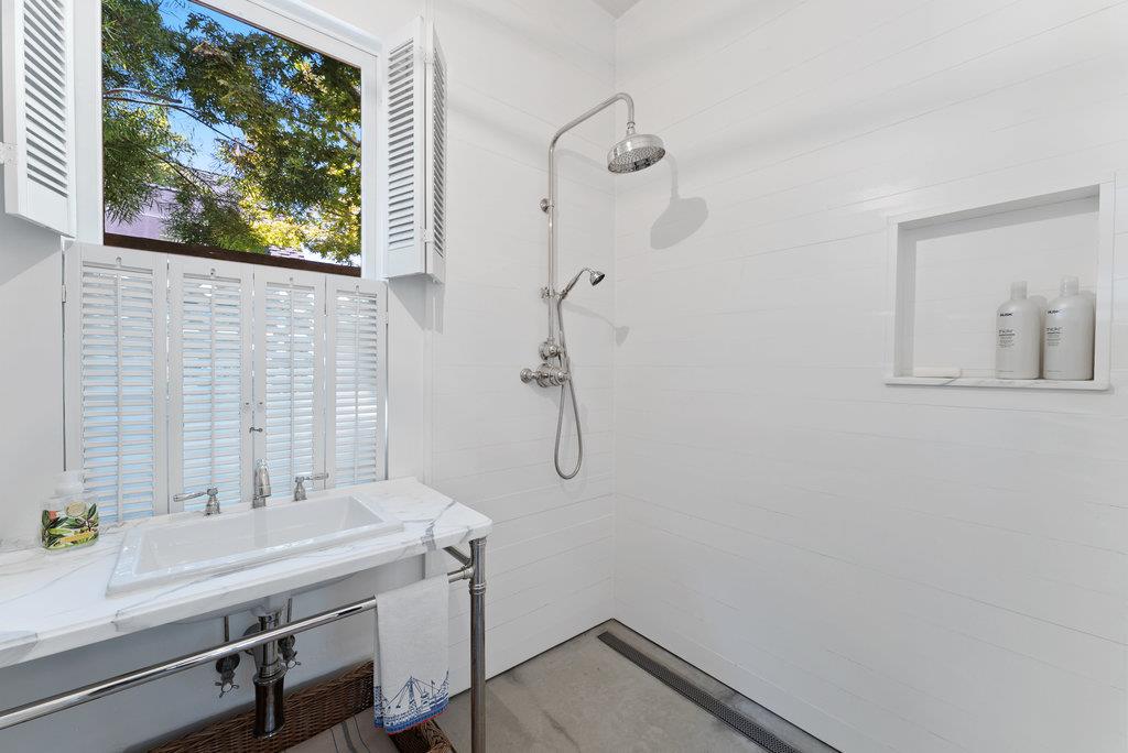 109 Central Avenue Capitola, CA 95010 - Photo 62 of 79 a bathroom with a sink and a window