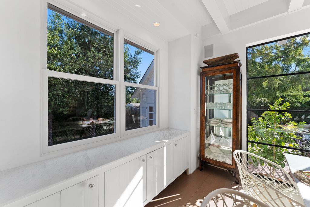 109 Central Avenue Capitola, CA 95010 - Photo 64 of 79 a view of a room with a large window and wooden floor