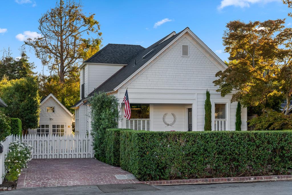 109 Central Avenue Capitola, CA 95010 - Photo 67 of 79 a front view of a house with a garden