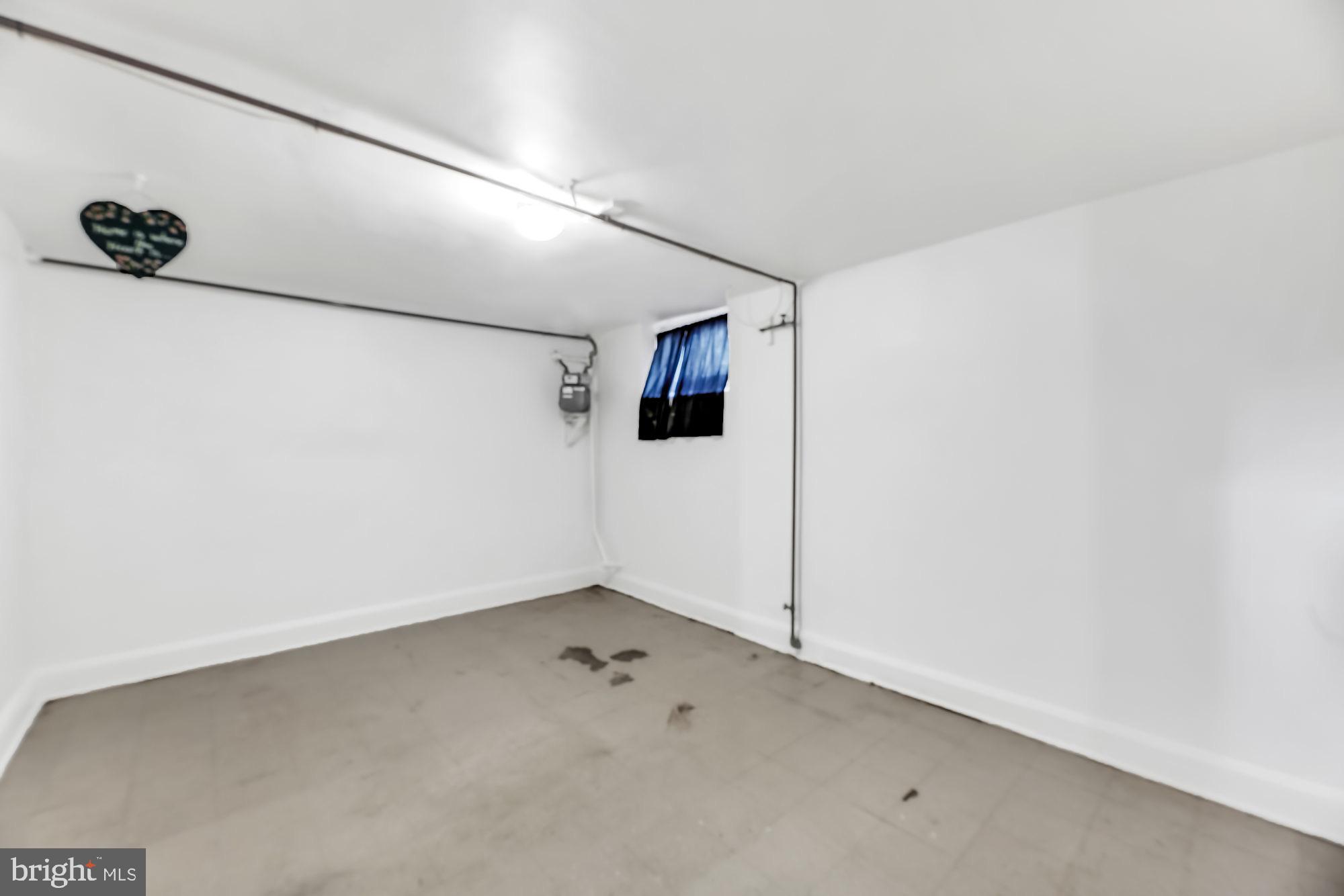 225 West Edgevale Road Baltimore, MD 21225 - Photo 21 of 25 Lower level rec space