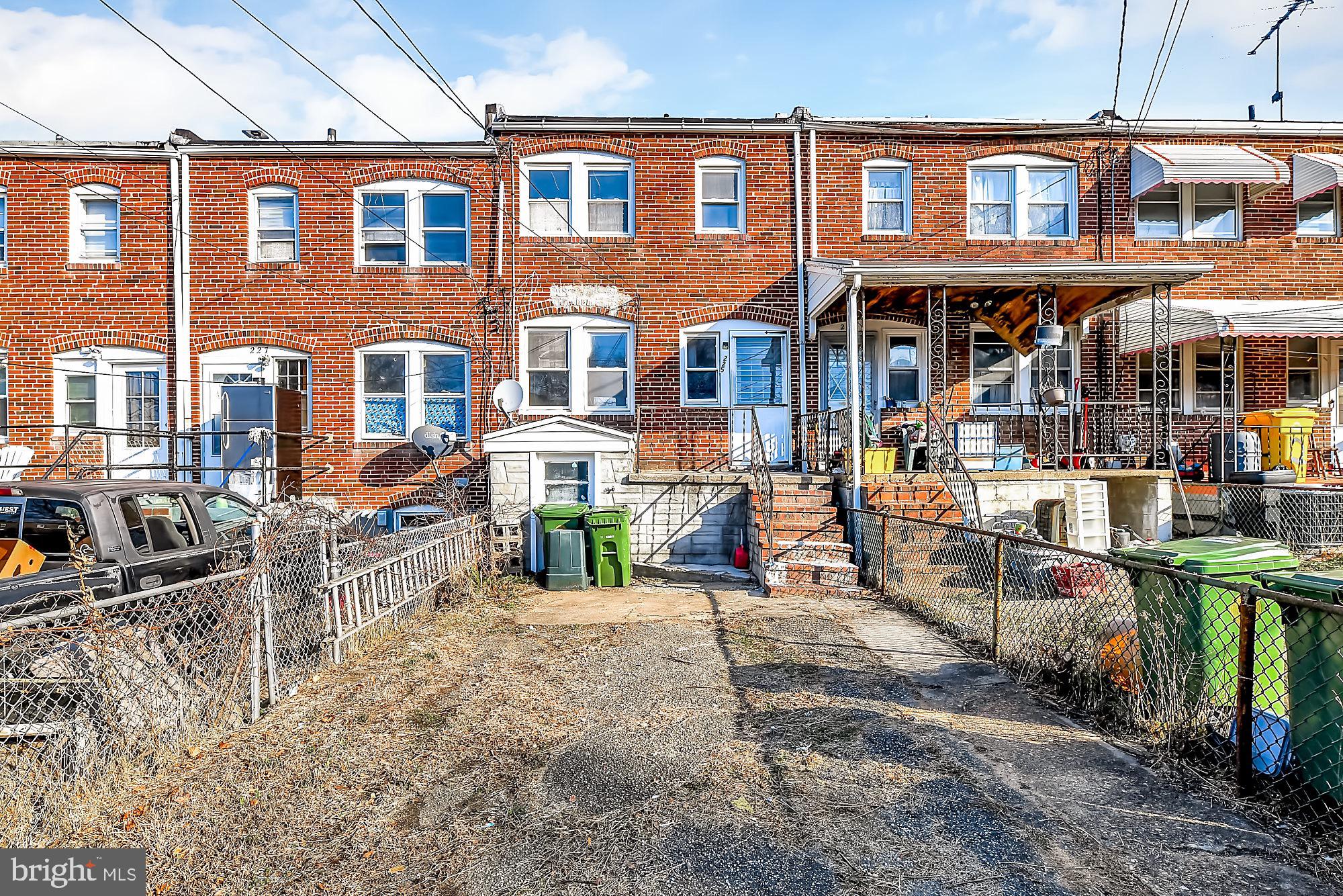 225 West Edgevale Road Baltimore, MD 21225 - Photo 23 of 25 Fenced rear yard and nice patio area