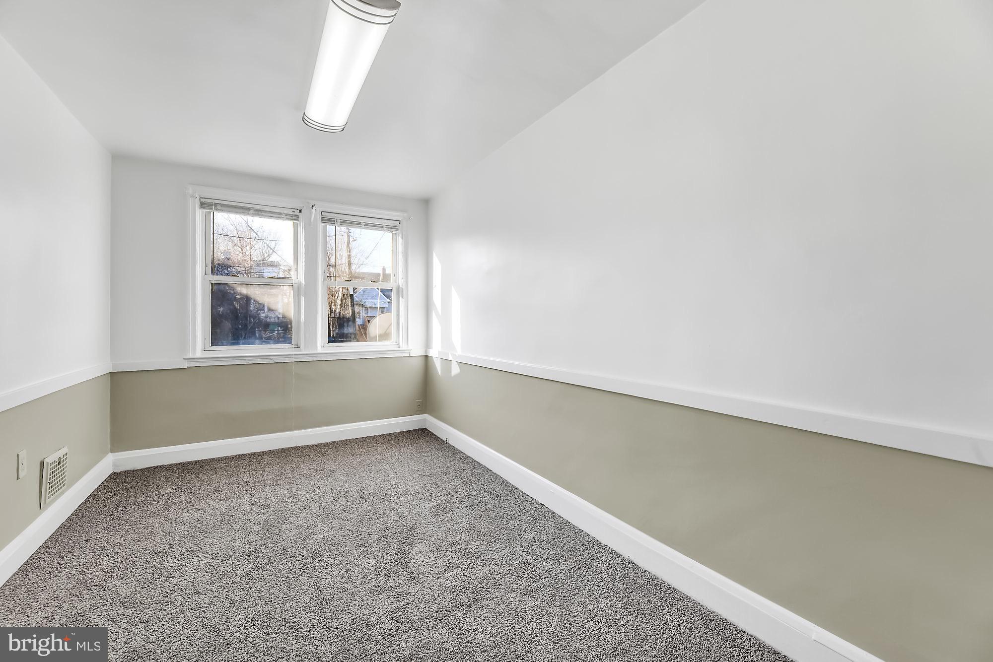 225 West Edgevale Road Baltimore, MD 21225 - Photo 6 of 25 Dining room with chair rail