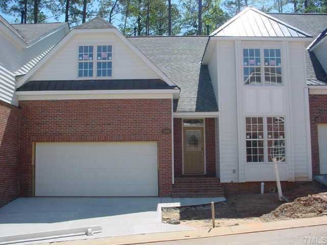 7346 Fontana Ridge Lane Raleigh, NC 27613 - Photo 1 of 1 a front view of a house with garage