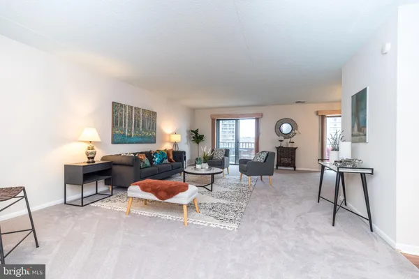a kitchen with stainless steel appliances granite countertop a refrigerator a sink and dishwasher