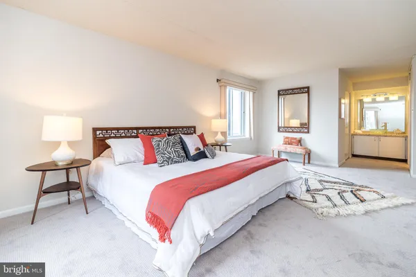 a view of a park with iron fence