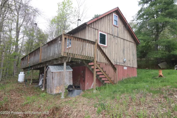 a view of backyard of house