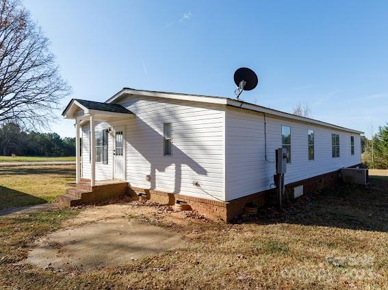 4195 Hurley Walters Road Lancaster, SC 29720 - Photo 3 of 16 a front view of a house with yard