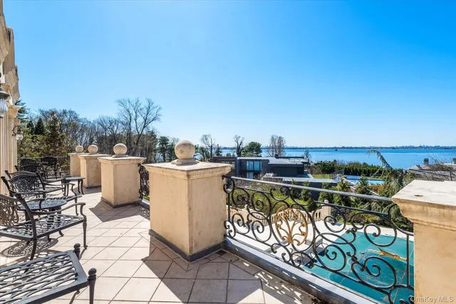 a view of a terrace with furniture and stove