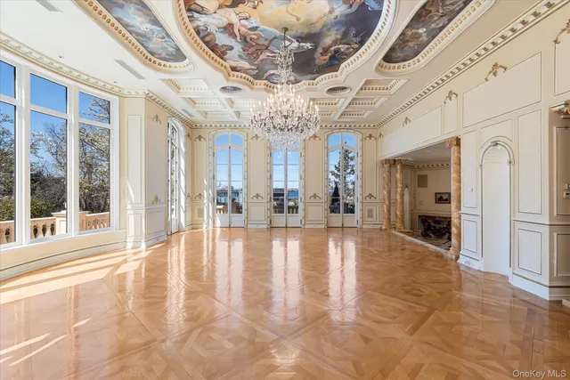 a view of an entryway with a chandelier